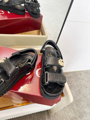 VELCRO STRAP SANDALS IN BLACK EMBOSSED LOGO LAMBSKIN GOLD HARDWARE