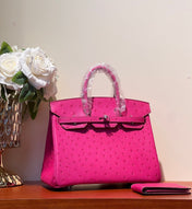 KELLY SELLIER 25 BAG IN BRIGHT PINK OSTRICH LEATHER WITH SILVER HARDWARE