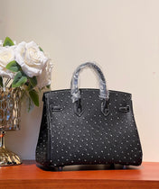 KELLY SELLIER 25 BAG IN BLACK OSTRICH LEATHER WITH WHITE RHINSTONES