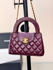 CHANEL 25S KELLY 19 CM IN WINE RED LAMBSKIN WITH GOLD HARDWARE