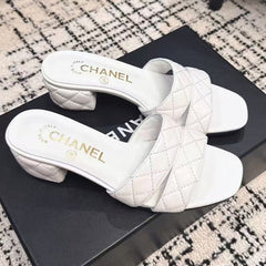 MID HEEL MULES IN WHITE SHEEPSKIN