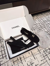 SLINGBACK LOAFER IN BLACK SUEDE AND SHEARLING