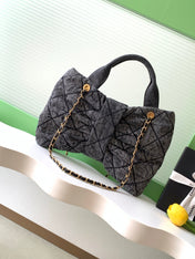CHANEL 25S MAXI BOW BAG 38 IN DARK GREY DENIM WITH GOLD HARDWARE