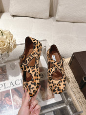 ALAIA 25S CRISS CROSS BALLET FLATS IN LEOPARD SUEDE