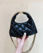 CHANEL HOBO 20 IN BLACK CALFSKIN GOLD HARDWARE