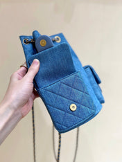 DRAWSTRING BUCKET BACKPACK 24 IN MALIBU BLUE DENIM GOLD HARDWARE