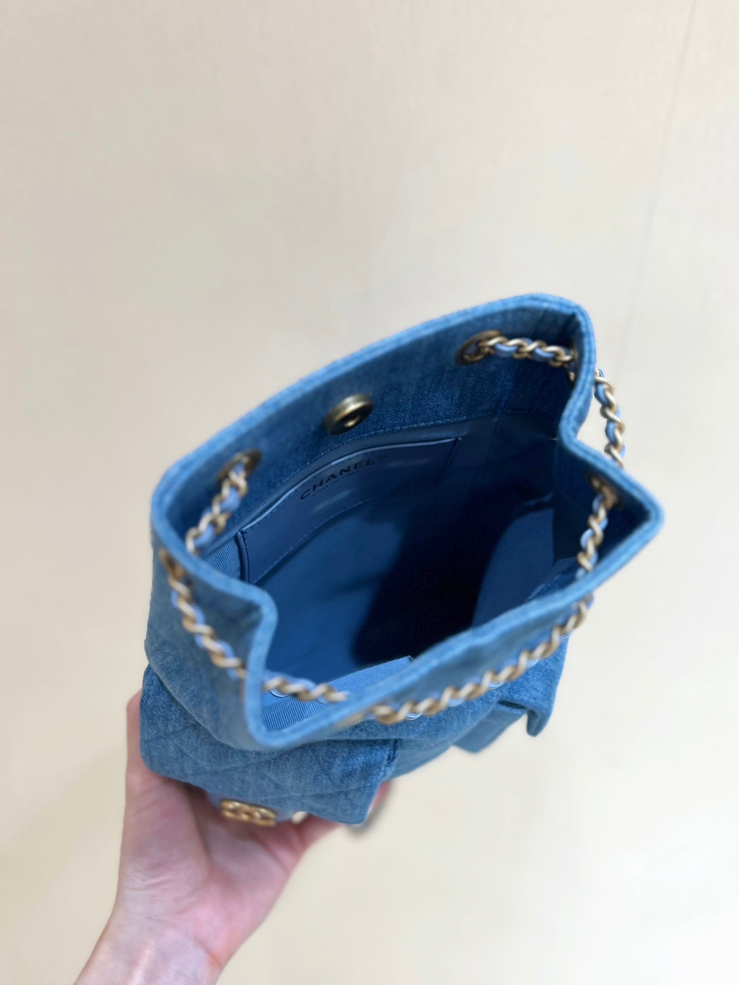 DRAWSTRING BUCKET BACKPACK 24 IN MALIBU BLUE DENIM GOLD HARDWARE