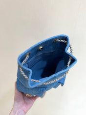 DRAWSTRING BUCKET BACKPACK 24 IN MALIBU BLUE DENIM GOLD HARDWARE