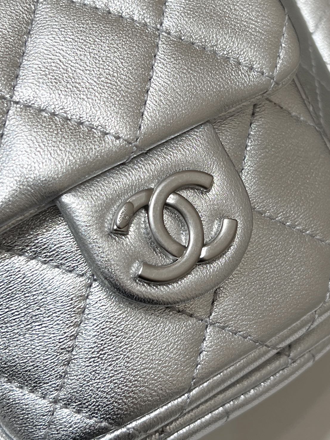 DRAWSTRING BUCKET BACKPACK 24 IN SILVER-TONE LAMBSKIN SILVER HARDWARE