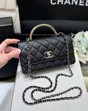 FLAP BAG WITH SILVER-TONE HANDLE 18 IN BLACK LAMBSKIN