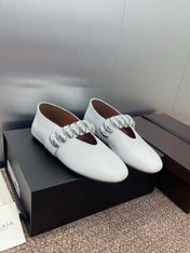ALAIA MARY JANE FLATS 25S IN WHITE CALFSKIN WITH SILVER HARDWARE