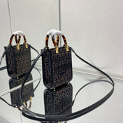 MINI SUNSHINE 18 IN BROWN RAFFIA AND BLACK WOOL CALFSKIN TRIM