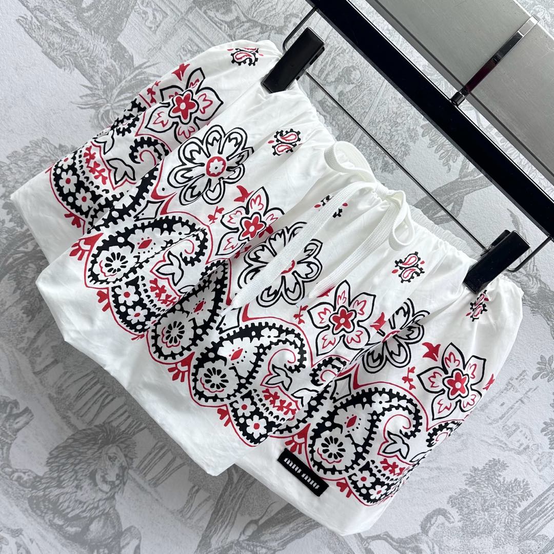 MIUMIU SHORT PLEATED SKIRT 267874