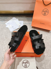 CHYPRE SANDAL IN BLACK SHEARLING AND CALFSKIN