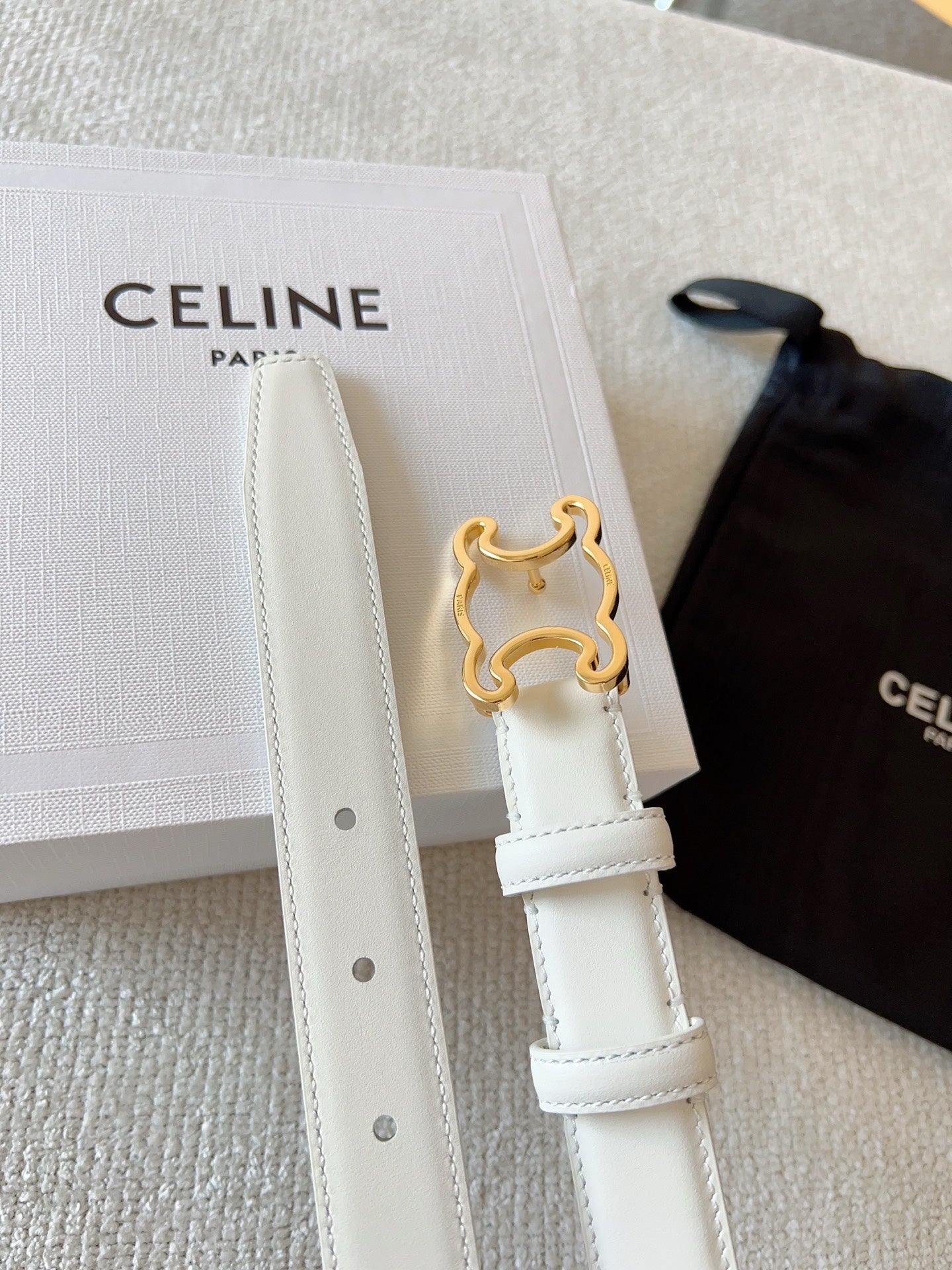 BELT 25MM TRIOMPHE LOGO CUT-OUT IN WHITE SMOOTH CALFSKIN WITH GOLD BUCKLE