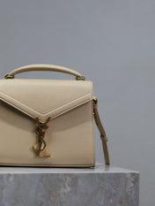 CASSANDRA MINI TOP HANDLE BAG 20 IN BEIGE CALFSKIN GOLD HARDWARE