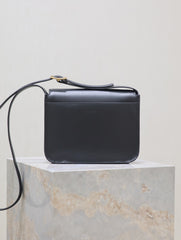 NIKI BABY 22 IN CHARCOAL GRAY CALFSKIN GOLD LOGO