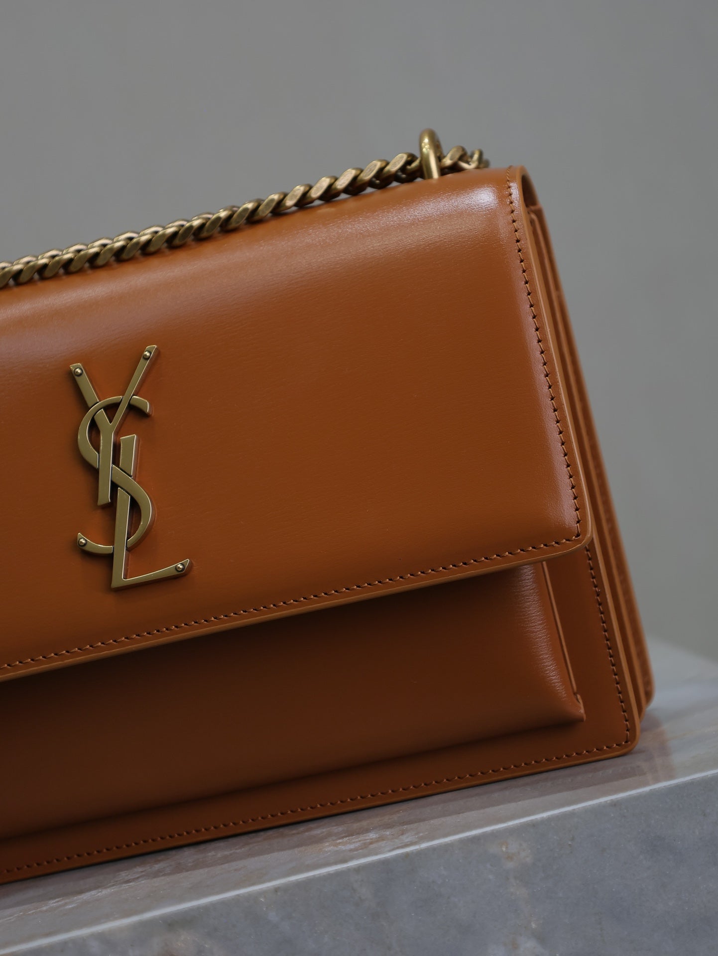 YSL 25S SUNSET BAG 22 IN DARK CARAMEL CALFSKIN GOLD HARDWARE