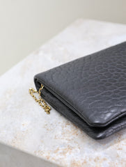 CALYPSO POUCH 24 IN BLACK ELEPHANT TEXTURED LAMBSKIN GOLD LOGO