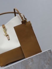 YSL 25S LE 5 À 7 BUCKET 26 IN CREAM BROWN CALFSKIN AND CANVAS GOLD HARDWARE