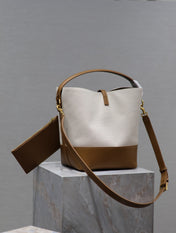 YSL 25S LE 5 À 7 BUCKET 26 IN CREAM BROWN CALFSKIN AND CANVAS GOLD HARDWARE