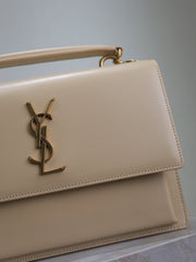 YSL 25S SUNSET MM 25 IN NUDE CALFSKIN GOLD HARDWARE