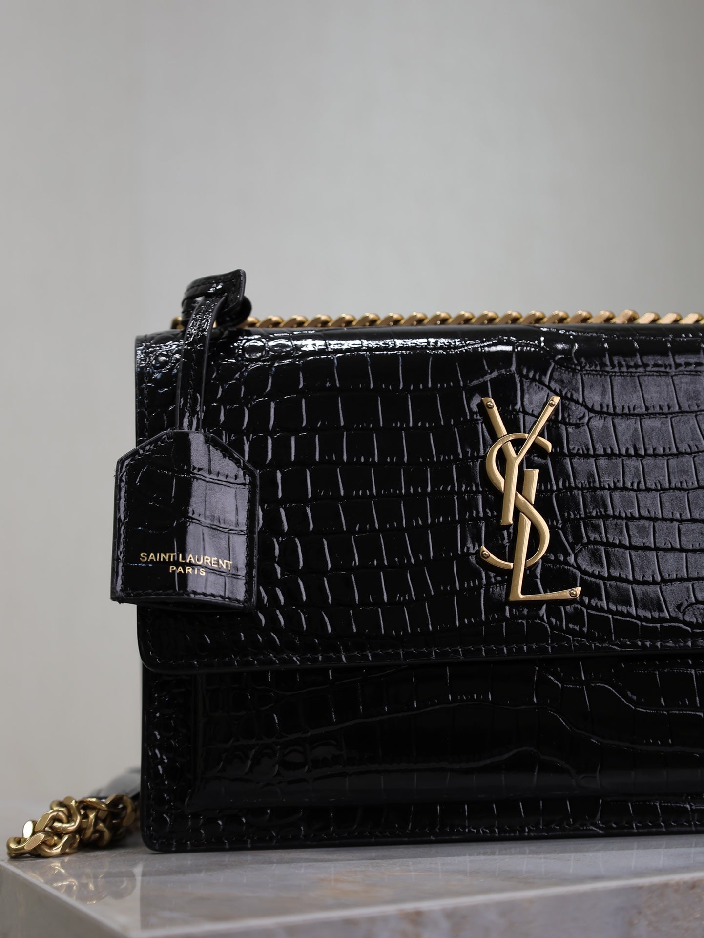 YSL 25S SUNSET MEDIUM 22 IN BLACK CROCODILE-EMBOSSED SHINY CALFSKIN GOLD HARDWARE
