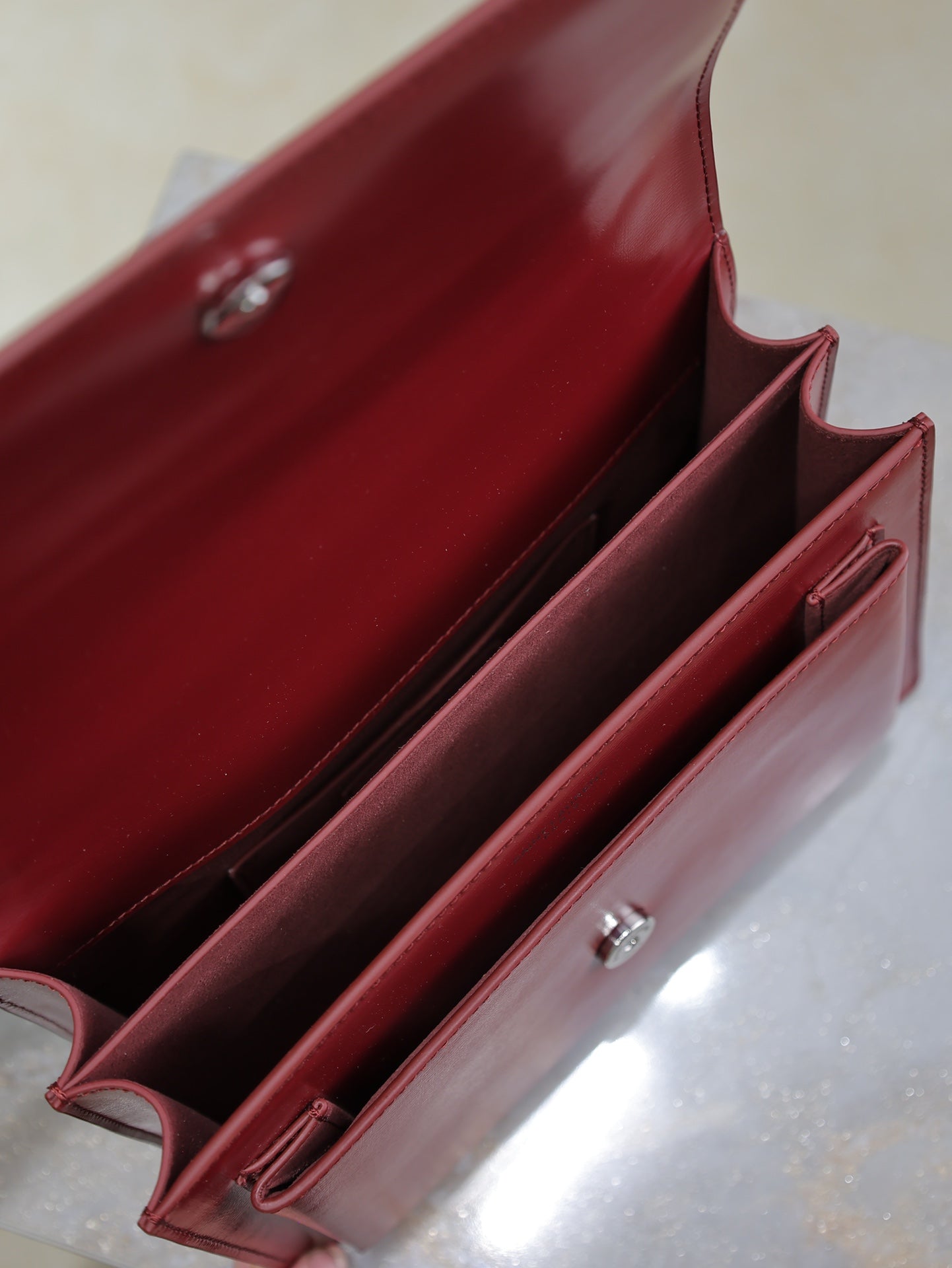 YSL 25S SUNSET BAG 22 IN CRIMSON RED CALFSKIN SILVER HARDWARE