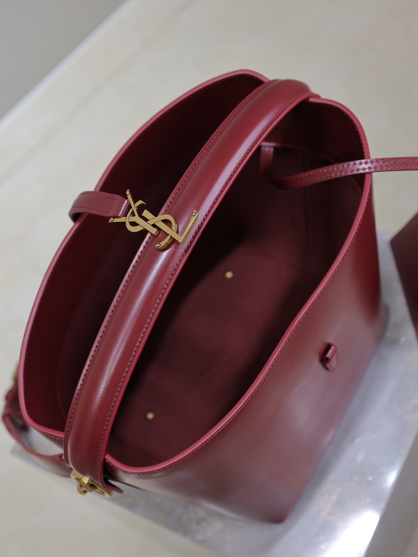 YSL 25S LE 5 À 7 BUCKET 26 IN DARK BURGUNDY CALFSKIN GOLD HARDWARE