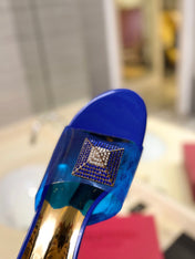 HIGH MULE 60MM IN COBALT BLUE SHEEPSKIN AND TRANSPARENT PVC