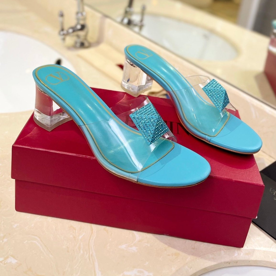 HIGH MULE 60MM IN AQUA BLUE SHEEPSKIN AND TRANSPARENT PVC