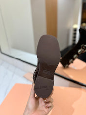 THICK-SOLED BUCKLE BOOTS IN BLACK SUEDE