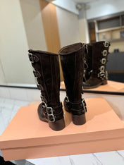THICK-SOLED BUCKLE BOOTS IN BLACK SUEDE