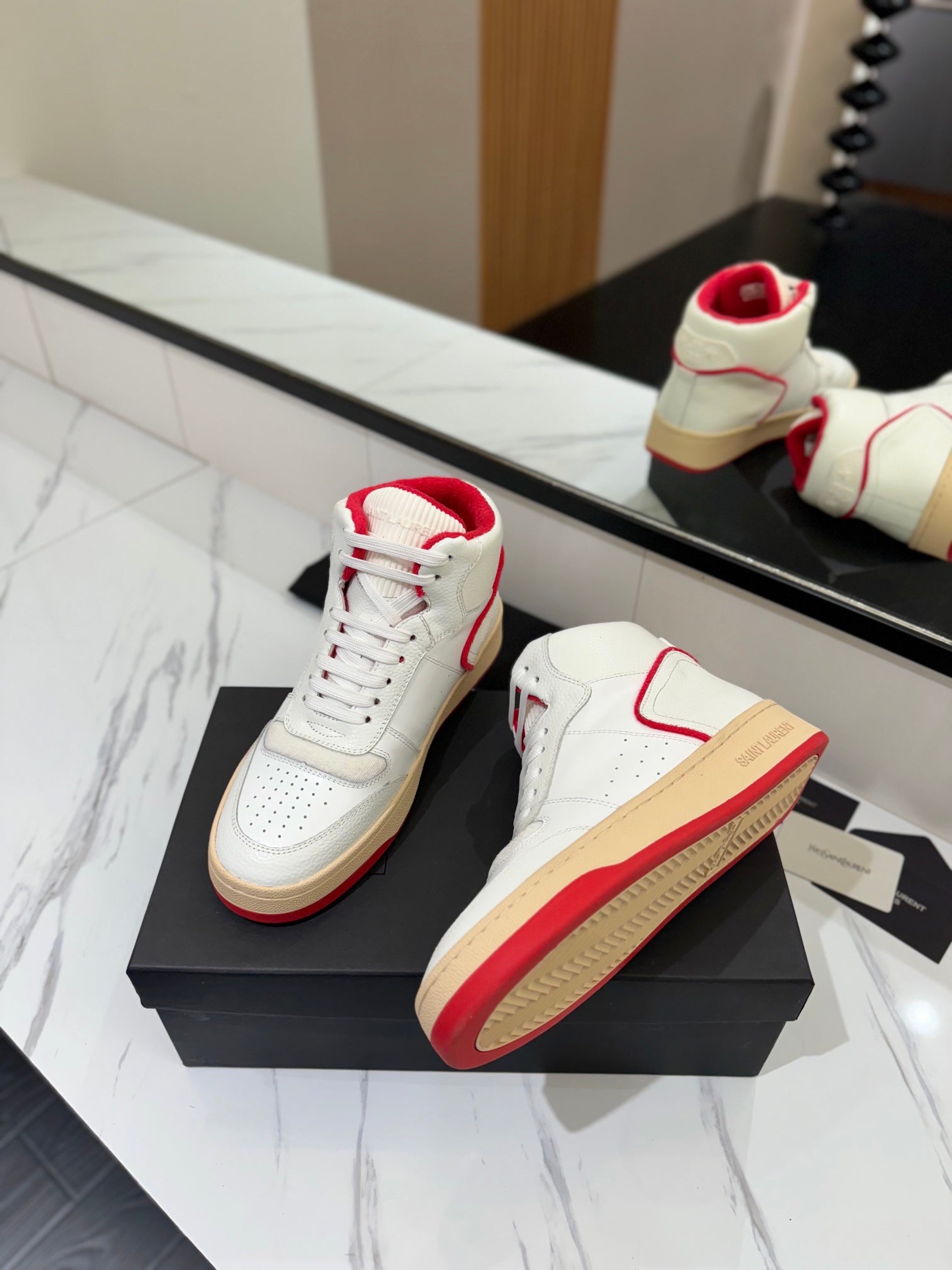 MID-TOP SNEAKERS IN WHITE AND RED TRIM PERFORATED LAMBSKIN