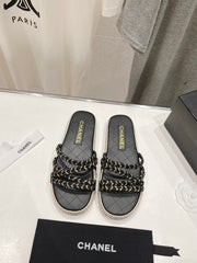 WOVEN STRAP SLIPPERS IN BLACK LAMBSKIN