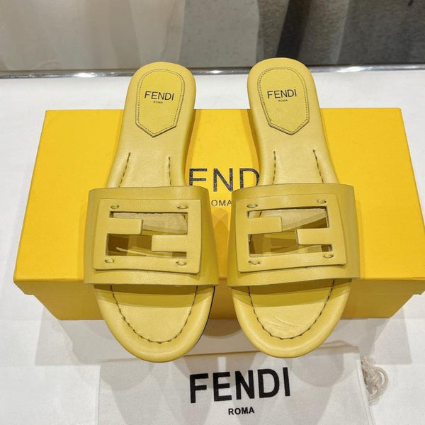 FENDI BAGUETTE SLIDES IN BRIGHT YELLOW LAMBSKIN