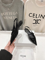 JUDY FLAT SLINGBACK IN BLACK PATENT CALFSKIN