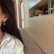 19 DOUBLE C SNOW SILVER EARRINGS